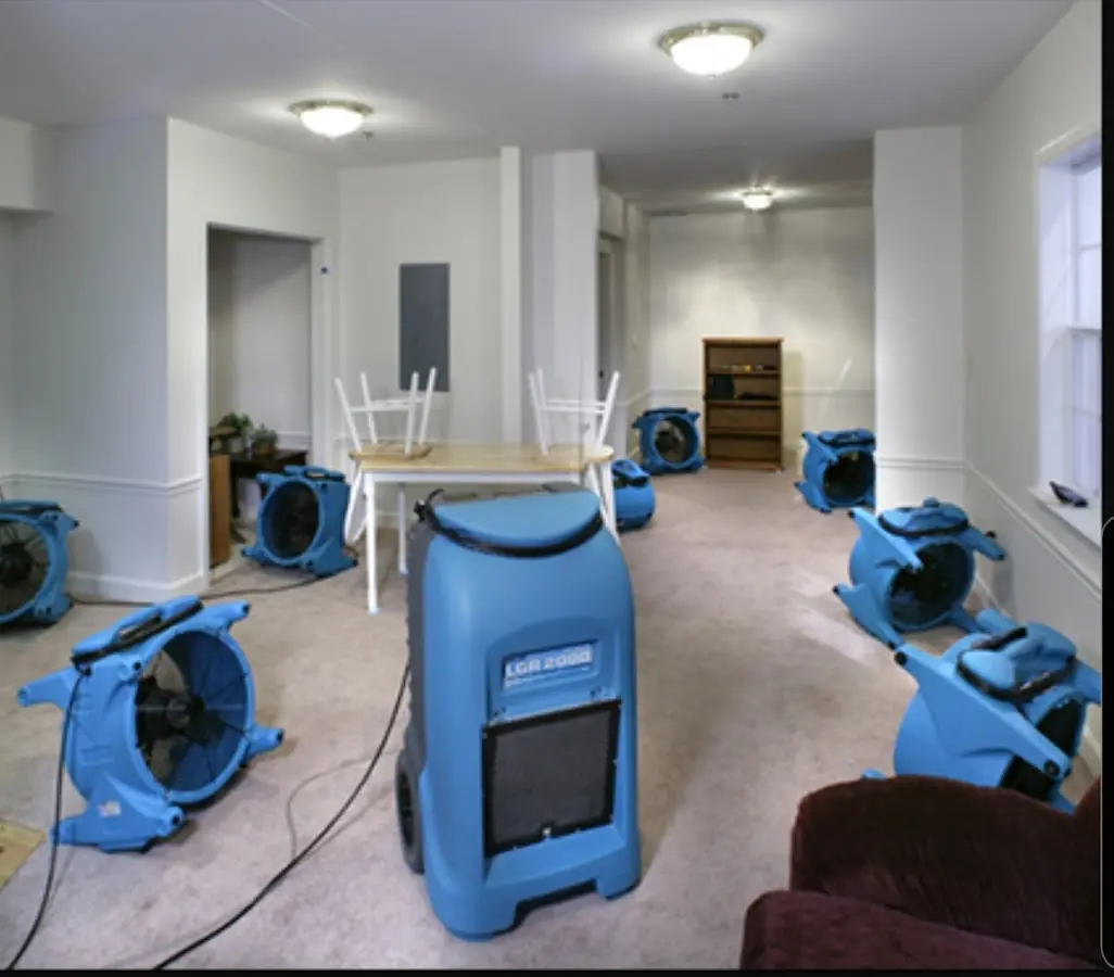 Air movers and dehumidifier setup for Water Damage Restoration in Brooklyn Park